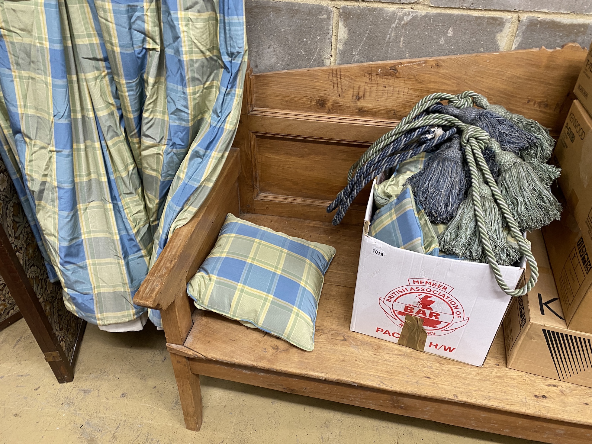 A pair of blue / green check lined curtains approximate widths 140cm top, 320cm floor, drop 250cm with five matching drapes, three cushions and four tie backs